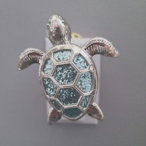 Used BBW Wallflower plug-in. Silver Turtle with Blue Glitter